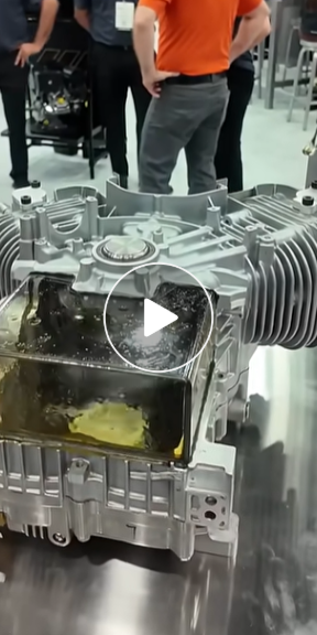 Video thumbnail that shows a display of the inner workings of the Vanguard Oil Guard System at a trade show.