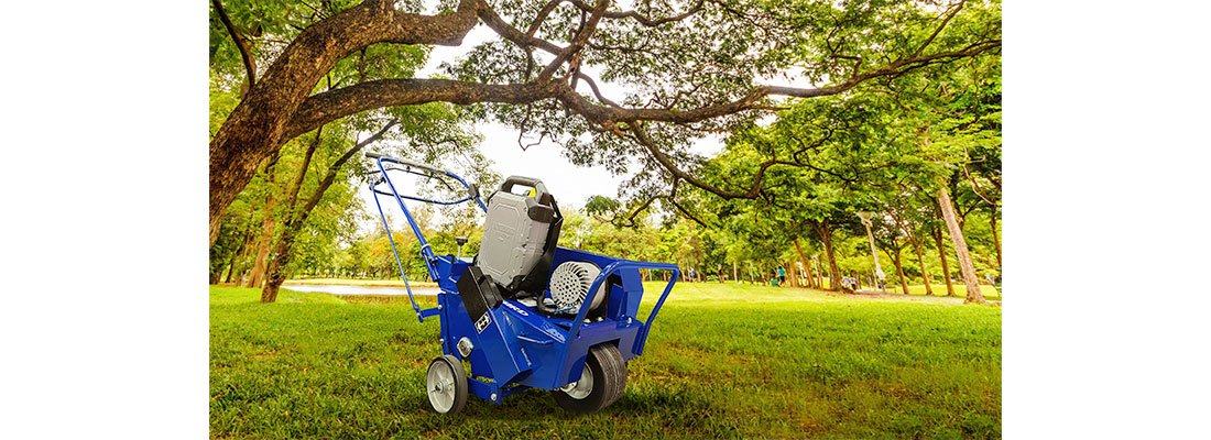 A Vanguard 48V 1.5kWh* Commercial Battery Pack powering an aerator.