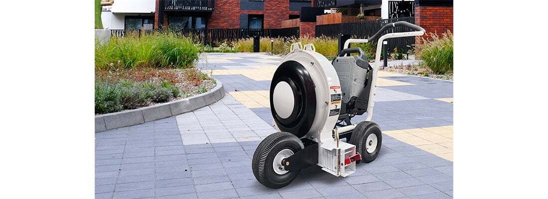 A Vanguard 48V 1.5kWh* Commercial Battery Pack powering a leaf blower.